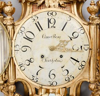 A Gustavian wall clock by Claes Berg, master 1762.