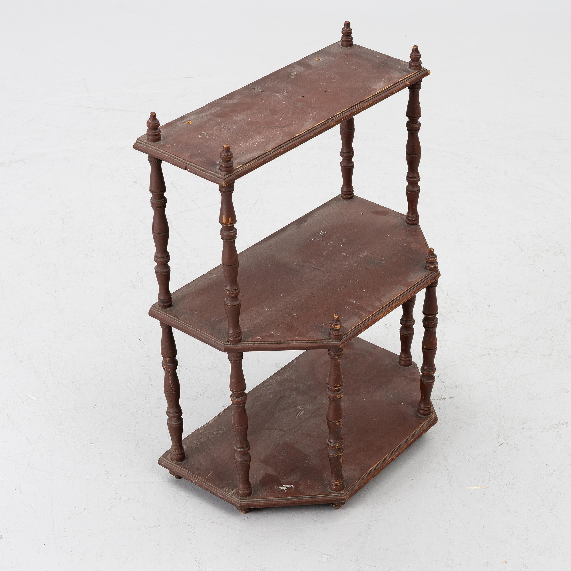 A wall shelf, 19th Century.
