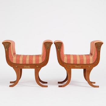 A pair of Swedish Royal Empire stools.