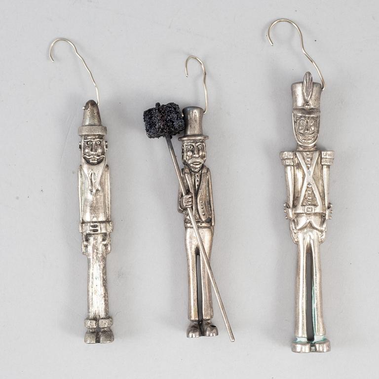 A set of three sterling figures.