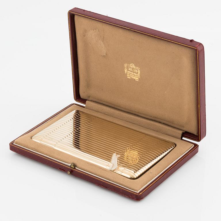 A Cartier cigarette case.