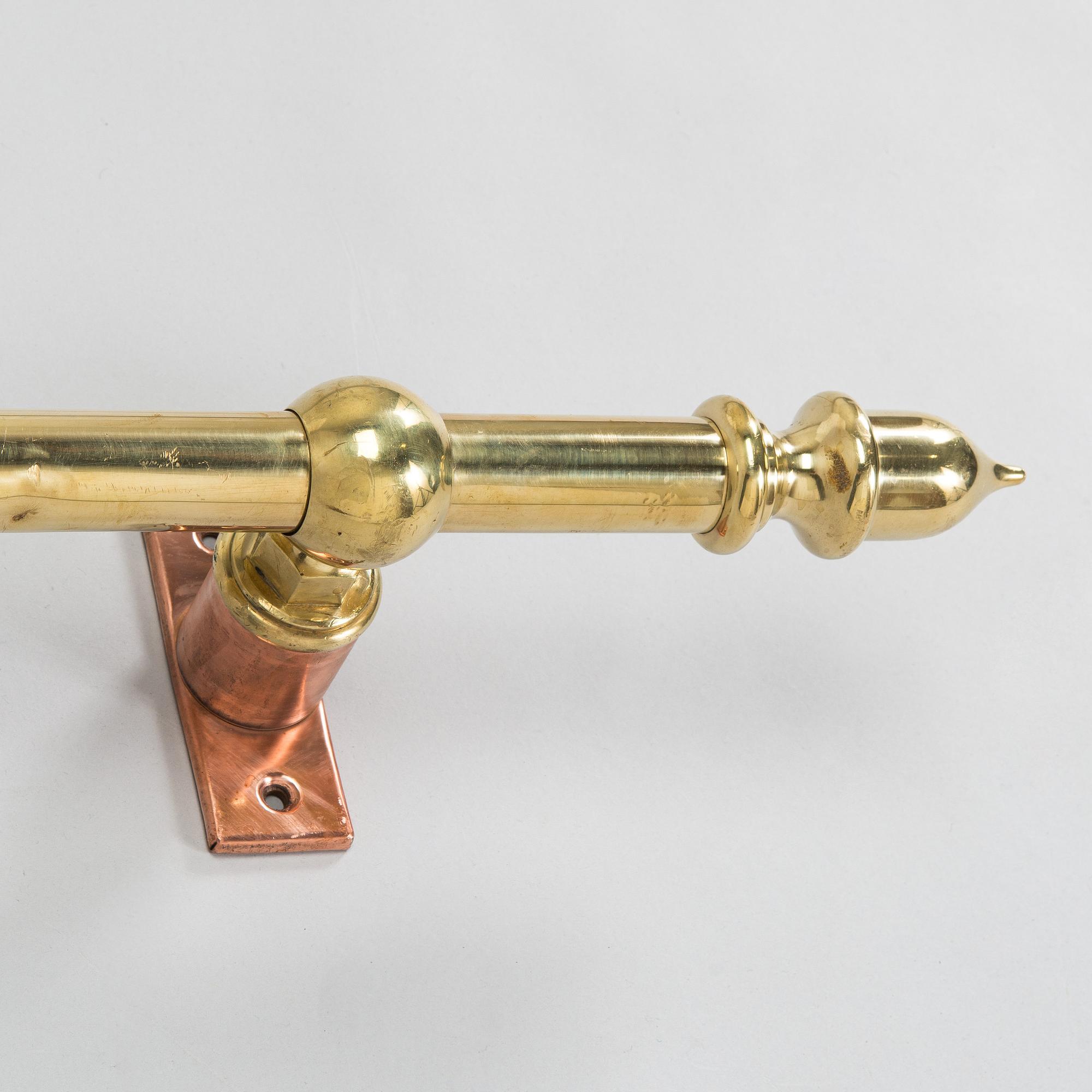 A late 20th century curtain rail / rod.