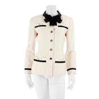 612. CHANEL, a black and white silk jacket.
