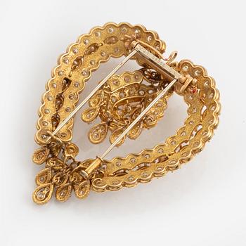 Van Cleef & Arpels brosch/hänge 18K guld med runda briljantslipade diamanter.