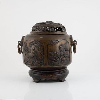 A bronze urn with stand, Japan, presumably Meiji (1868-1912).