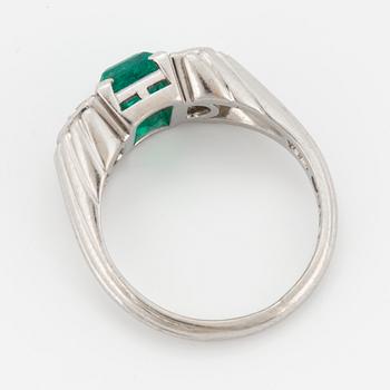 A WA Bolin platinum ring set with a faceted emerald ca 0.90 cts.