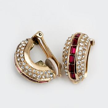 CHRISTIAN DIOR, a gold colored necklace and a pair of earclips.