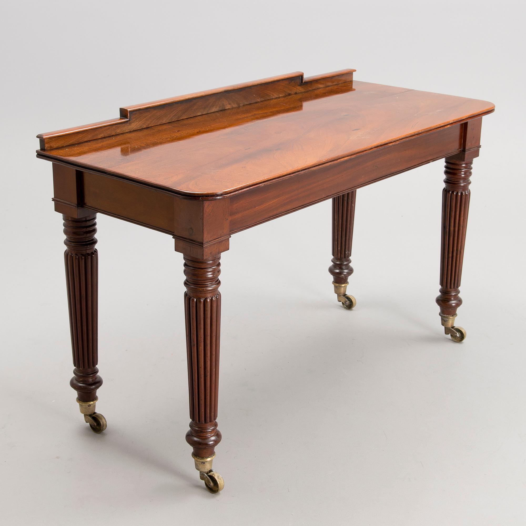 A Victorian mahogany table, latter half of the 19th century.