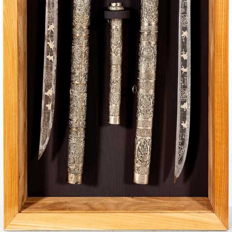 A set of three Burmese 'Dha' swords, late 19th /early 20th Century.