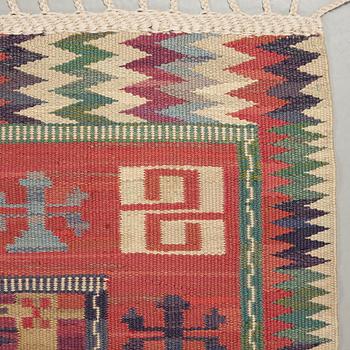 A CARPET, "Bäckahästen", a fine flat weave, 309 x 196,5 cm, signed MMF.