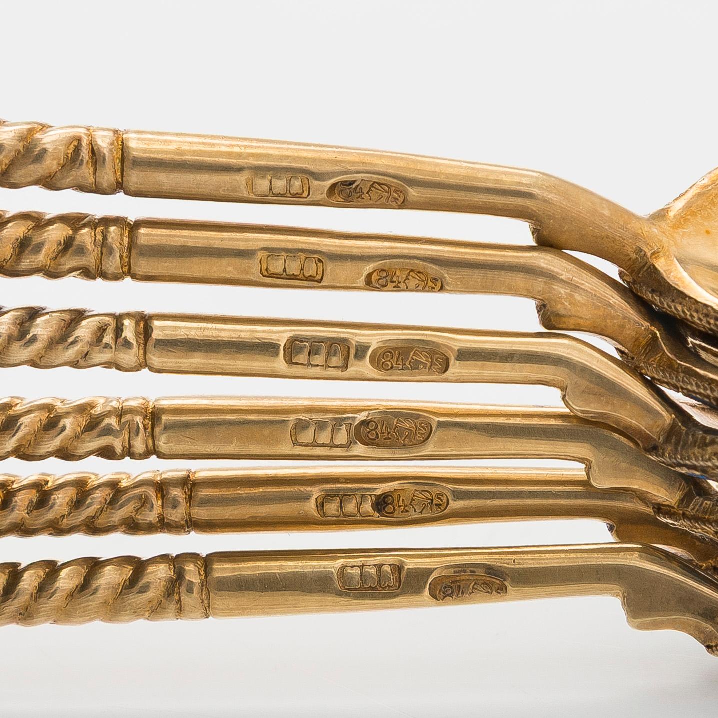 A set of six cloisonné enamel silver gilt teaspoons, Moscow 1898-1914.