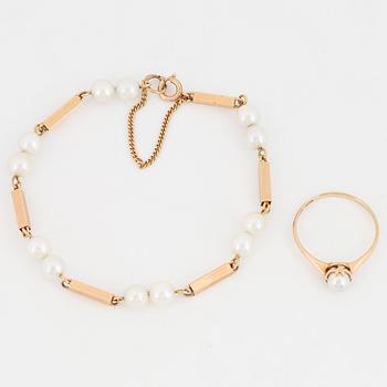 18K gold pearl bracelet and ring.