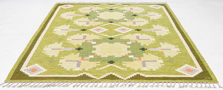 Ingegerd Silow, a carpet,'Nejlikan', flat weave, c 283 x 194 cm, signed IS.