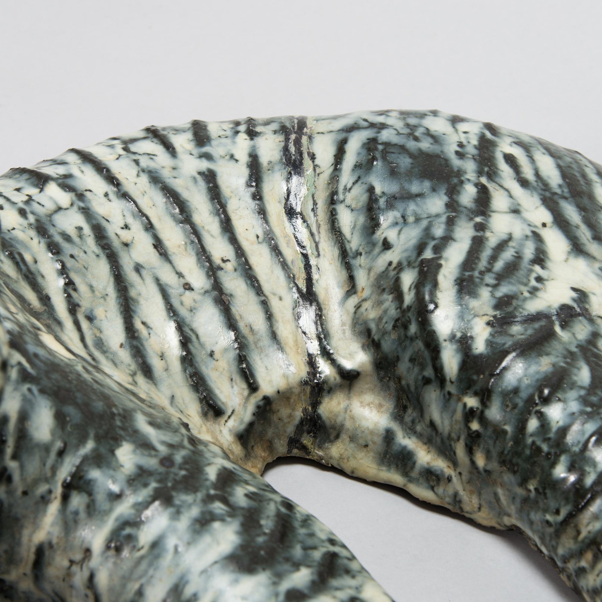 Michael Schilkin, a stoneware sculpture, signed Schilkin.