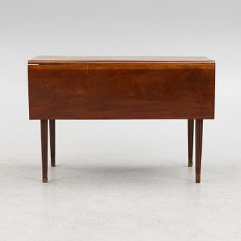 Table with drop leaves, 19th century.