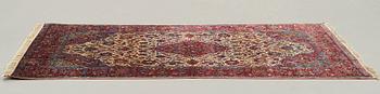 MATTO, a semi-antique silk Kashan, ca 208,5 x 130 cm.