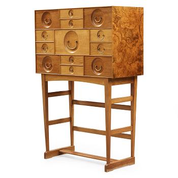 24. A Josef Frank cabinet on stand, model nr 2237, Svenskt Tenn, Sweden 1965, signed to the back.