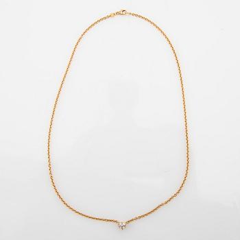 Necklace, 18K gold with heart-shaped diamond.