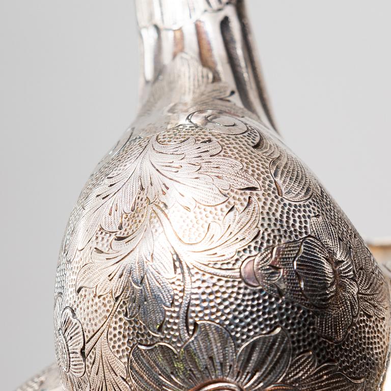 A silver teapot, unknown maker's mark F.G, assay master mark Dimitri Ilyich Tverskoy, Saint Petersburg, Russia 1844.