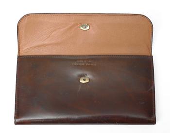 An darkbrown leather evening bag/wallet by Celine.