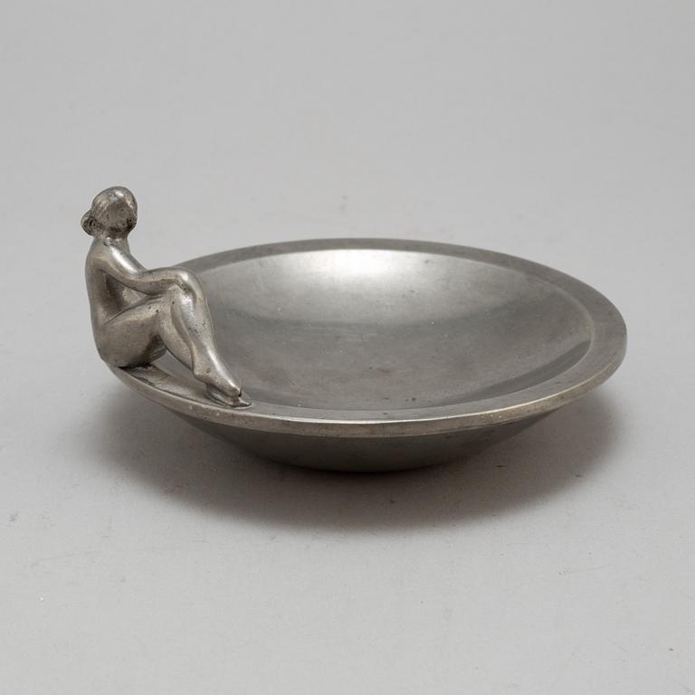 a pewter plate by Firma Svenskt Tenn Stockholm, 1928.