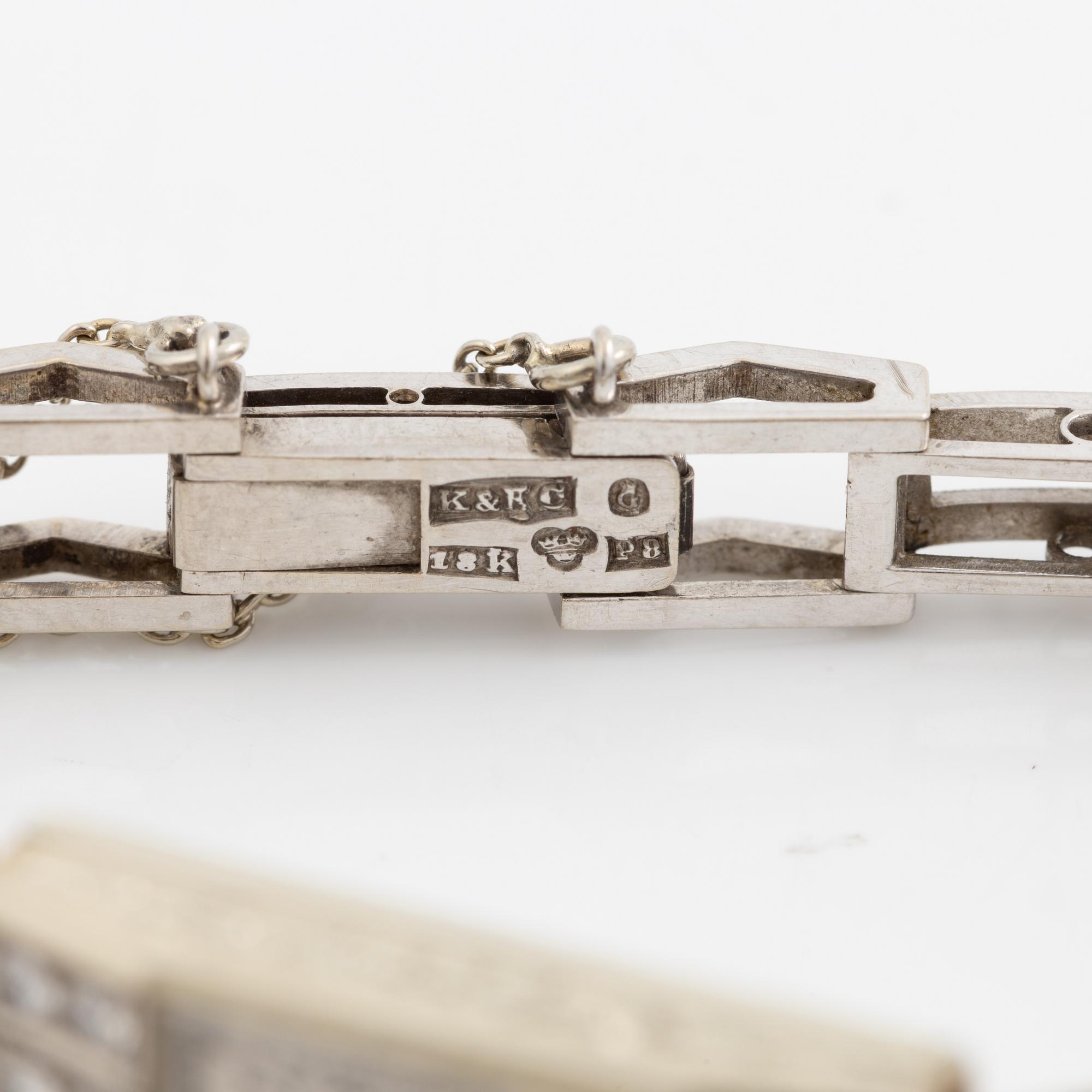 Armbandsur, art déco, länk 18K vitguld med briljantslipade och gammalslipade diamanter, K& KC Göteborg 1941.