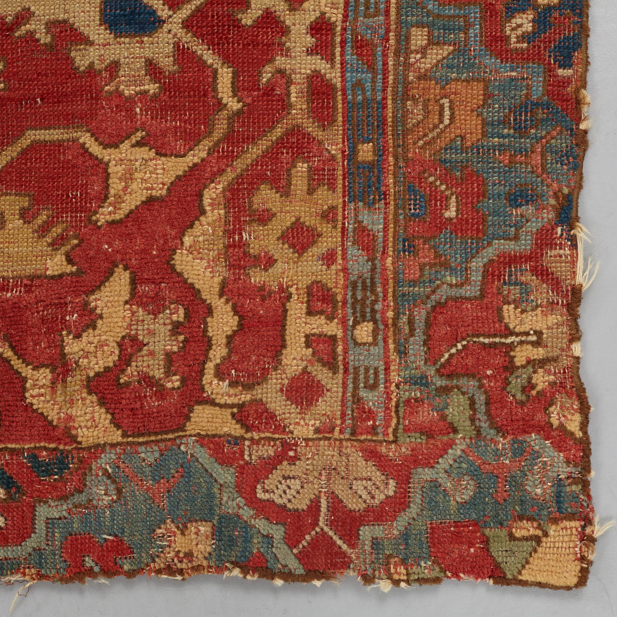 A CARPET FRAGMENT, an antique Western Anatolian "Lotto", 17th century, ca 105 x 125 cm.