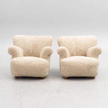 A pair of Swedish Modern armchairs, mid-20th Century.