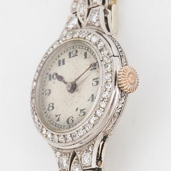 White gold and diamond ladies watch.