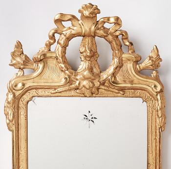 A rococo giltwood two-branch girandole by J. Åkerblad (master in Stockholm 1756-99).