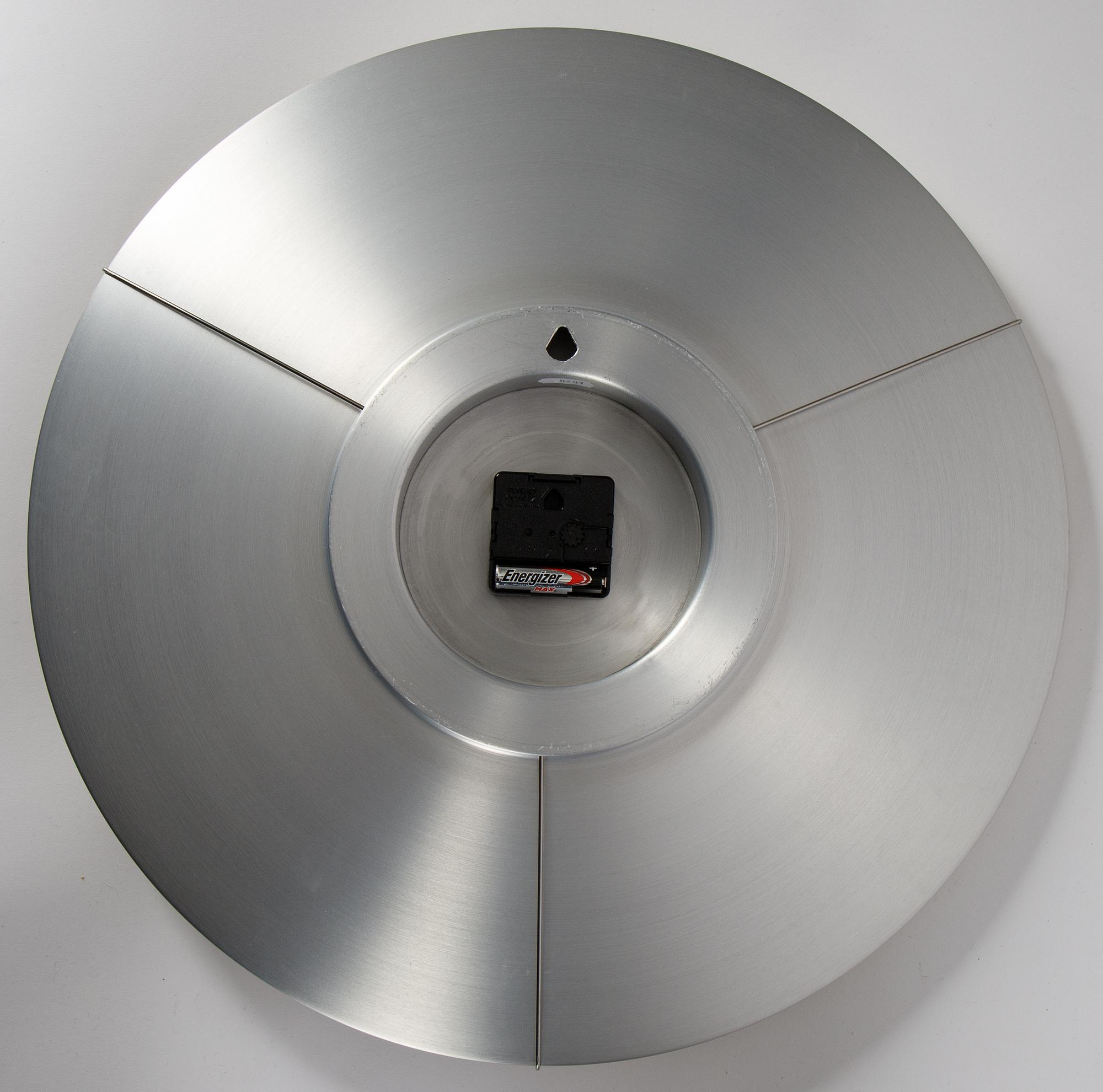 Arne Jacobsen, an aluminium quartz 'Bankers' wall clock by Georg Christensen, designed in 1971.