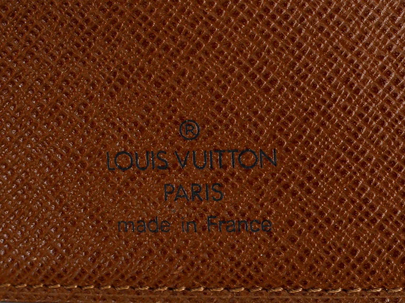 PLÅNBOK, "Compact zippy", Louis Vuitton.