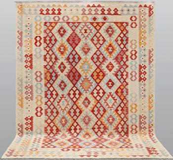 A Kilim carpet, ca 294 x 214 cm.