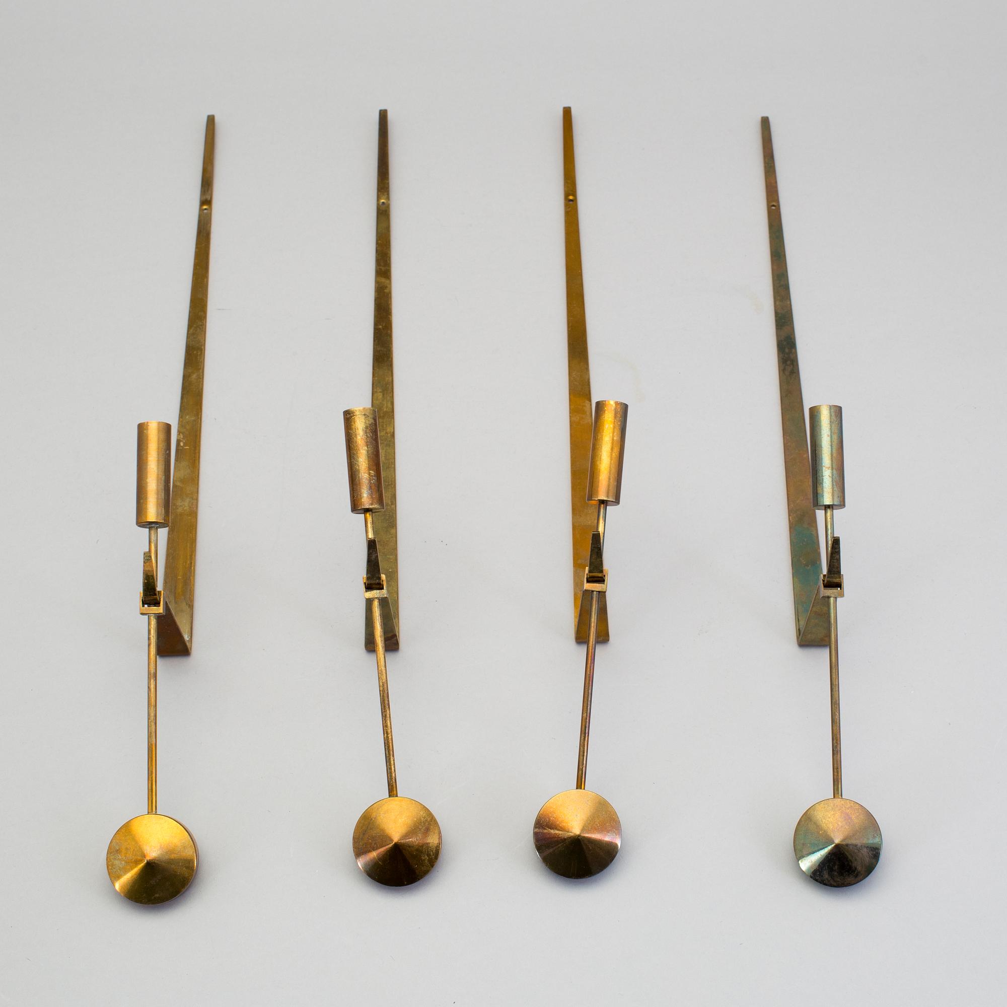 A set of four wall sconce by Pierre Forsell, Skultuna.