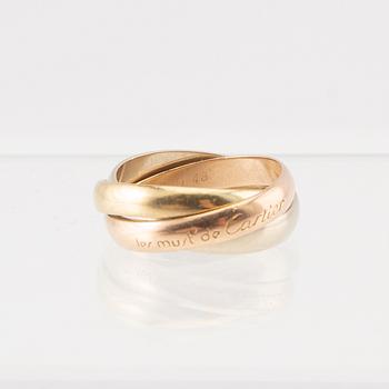 An 18K tri-coloured "Trinity" gold ring by Cartier.