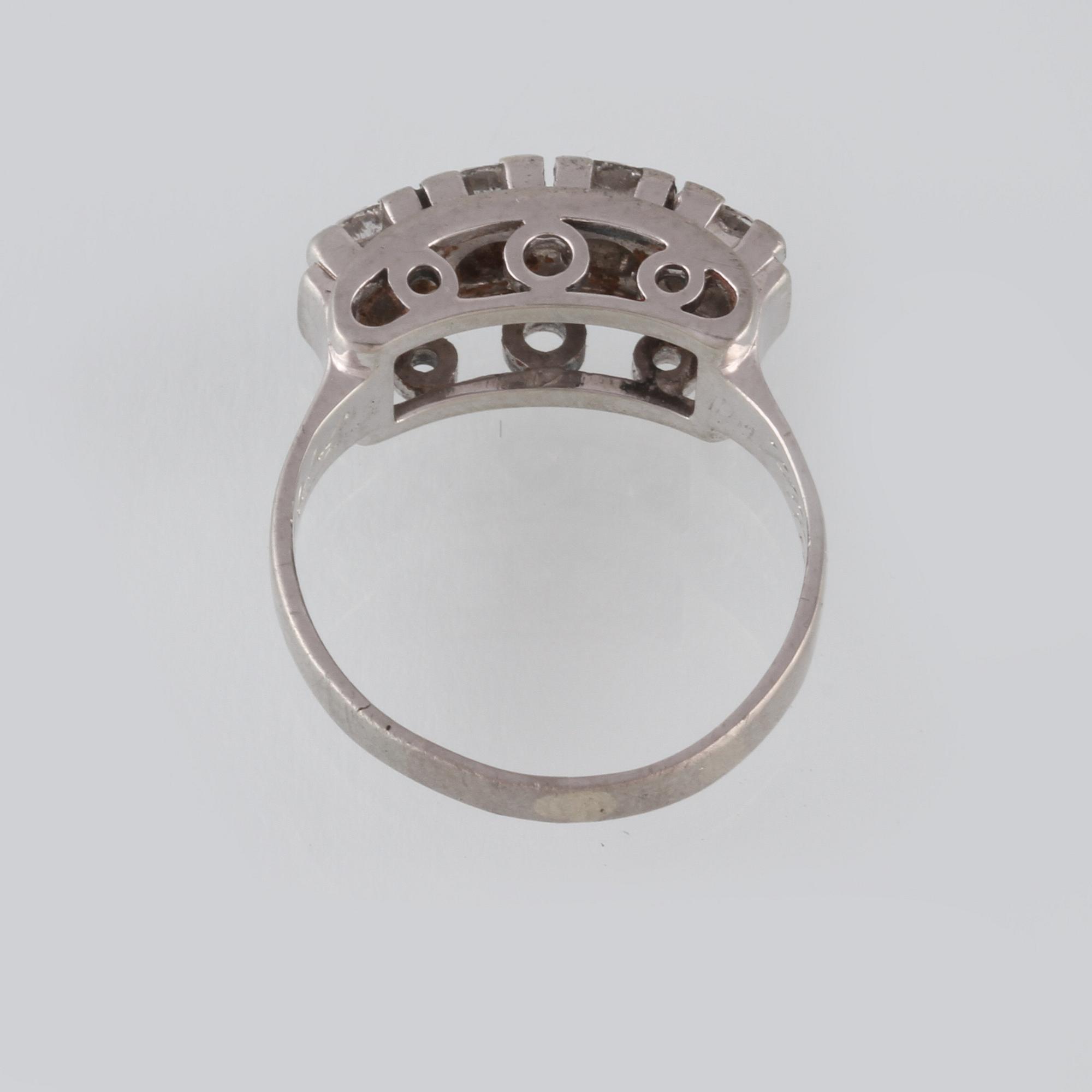 RING, 18K vitguld med 4 briljantslipade diamanter 0.59 ct, kattfotstämplad. Vikt 4,7 gram.