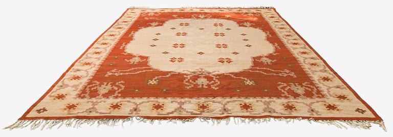 A Finnish flat weave carpet , possibly Orkamo Oy, Finland. Circa 400 x 300 cm.