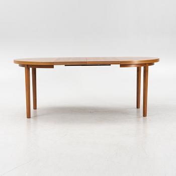 A round teak dining table, second part of the 20th Century.