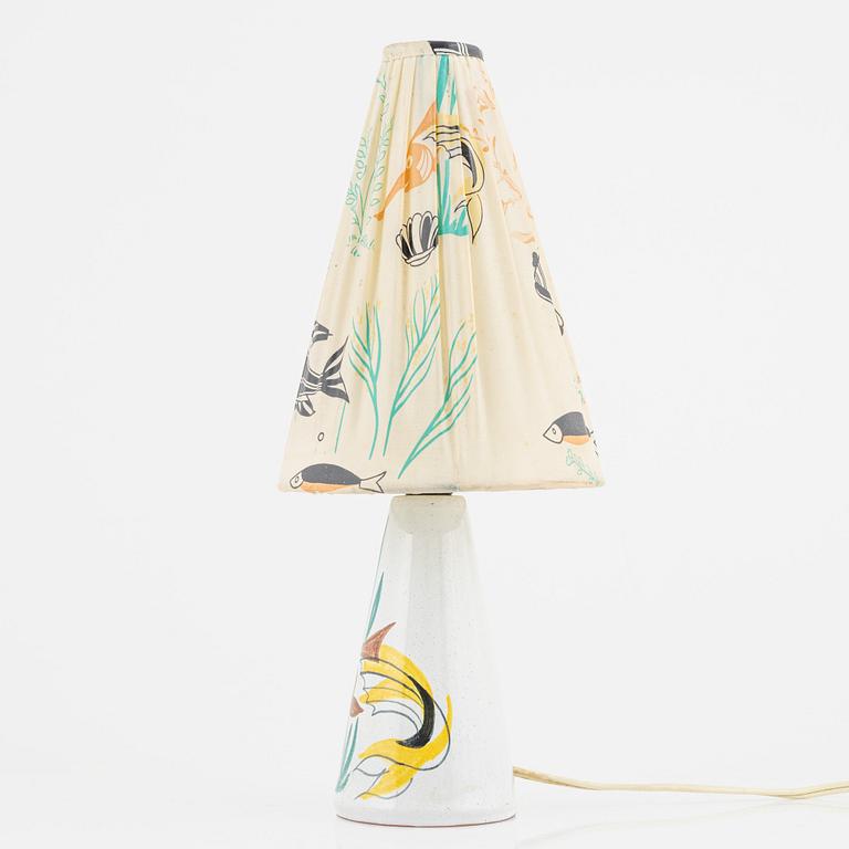 A Tilgmans table lamp with original lampshade.