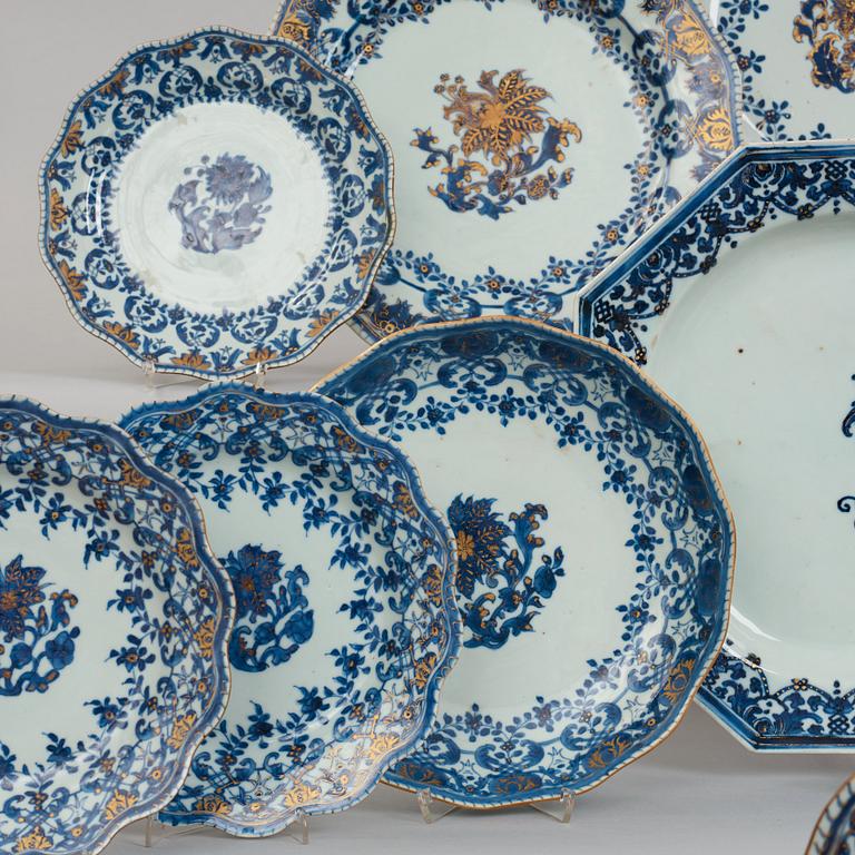 A blue and white dinner service, Qing dynasty, 18th Century. (76 pieces).