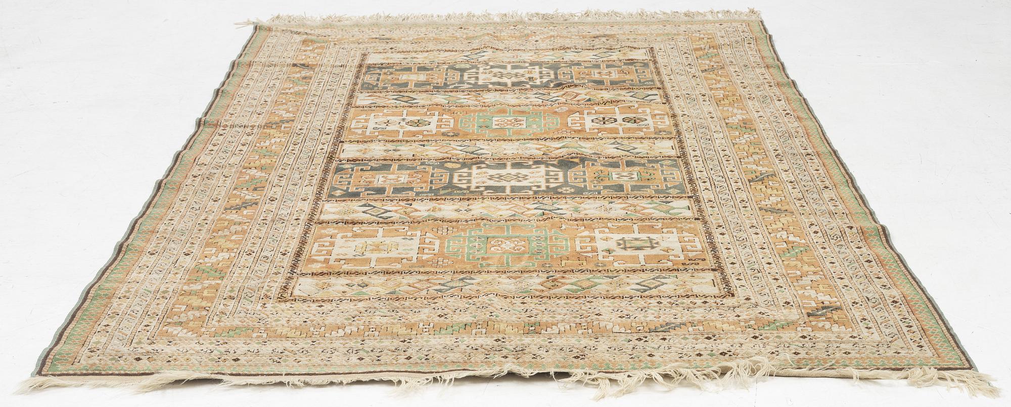 An Indian carpet, c.261 x 180 cm.