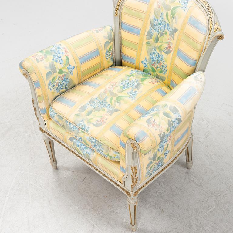 A Louis XVI style armchair, 20th Century.