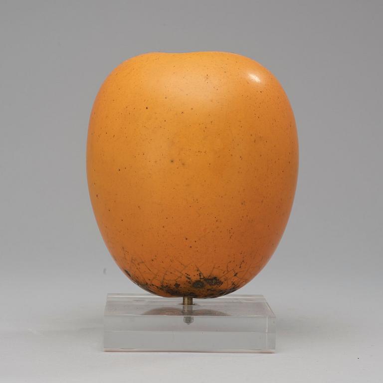 A Hans Hedberg faience sculpture of a plum, Biot, France.