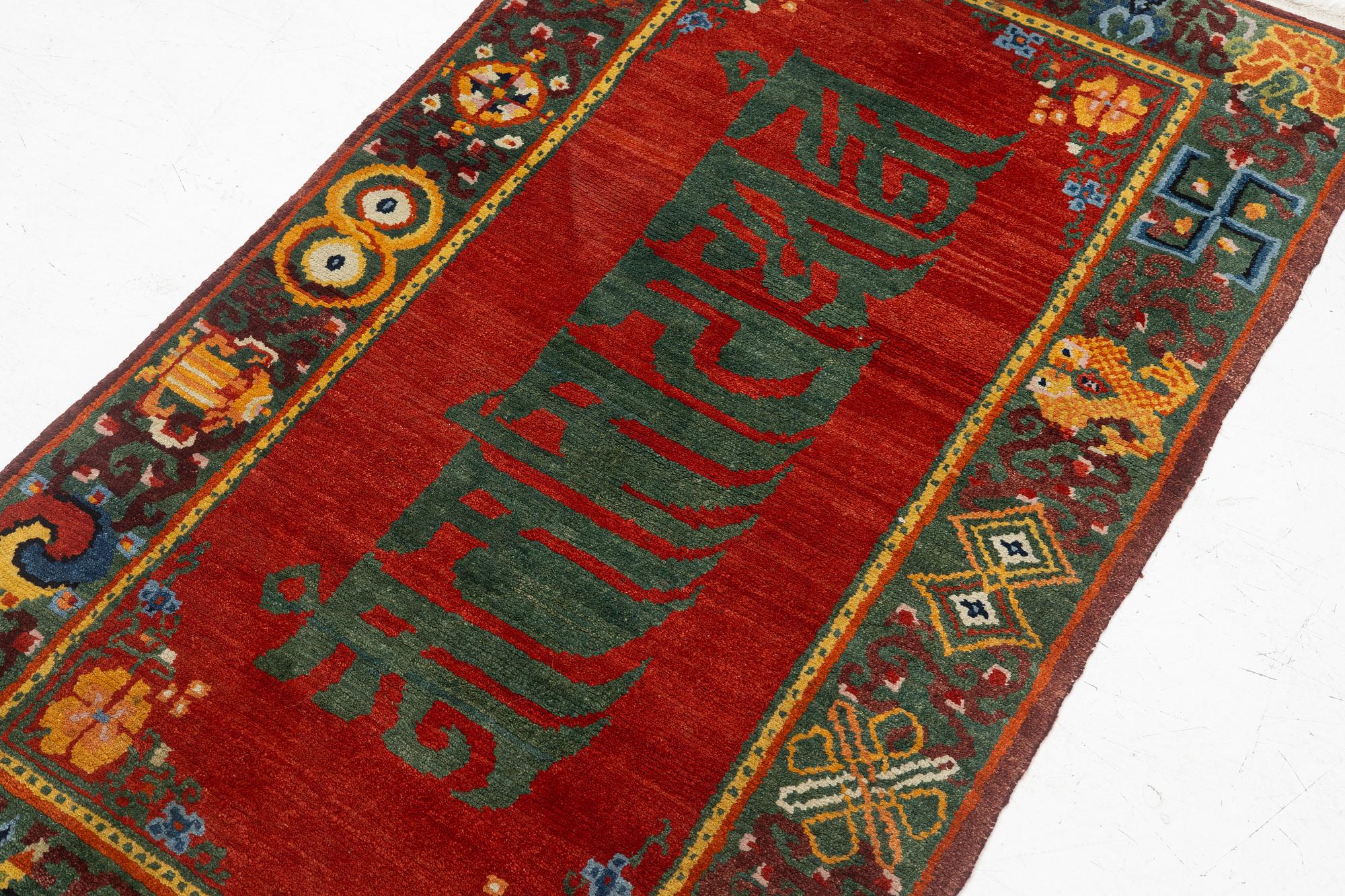 A Nepalese rug, c. 157 x 91cm.