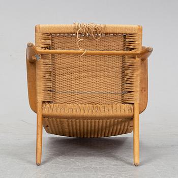 A 'CH-25' armchair designed by Hans J Wegner for Carl Hansen & Søn, Denmark.
