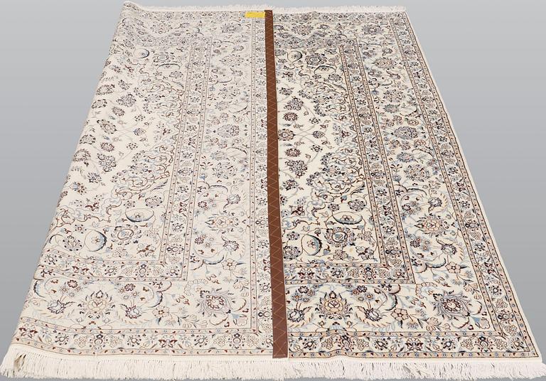 A Nain part silk carpet, 210 x 200 cm.