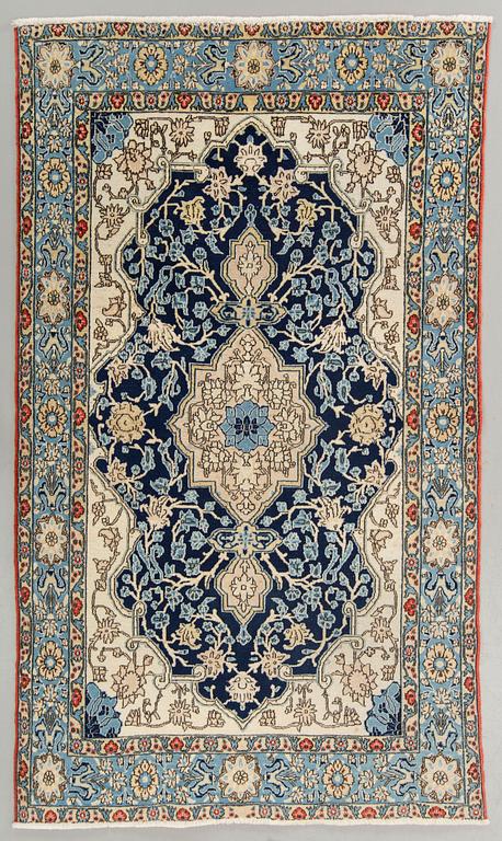 An old Shahreza carpet ca 221 x 138 cm.