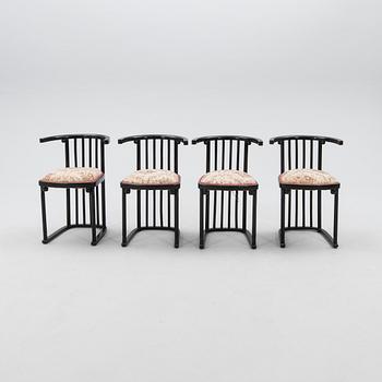 A set of four armchairs by Mundus, first half of the 20th century.