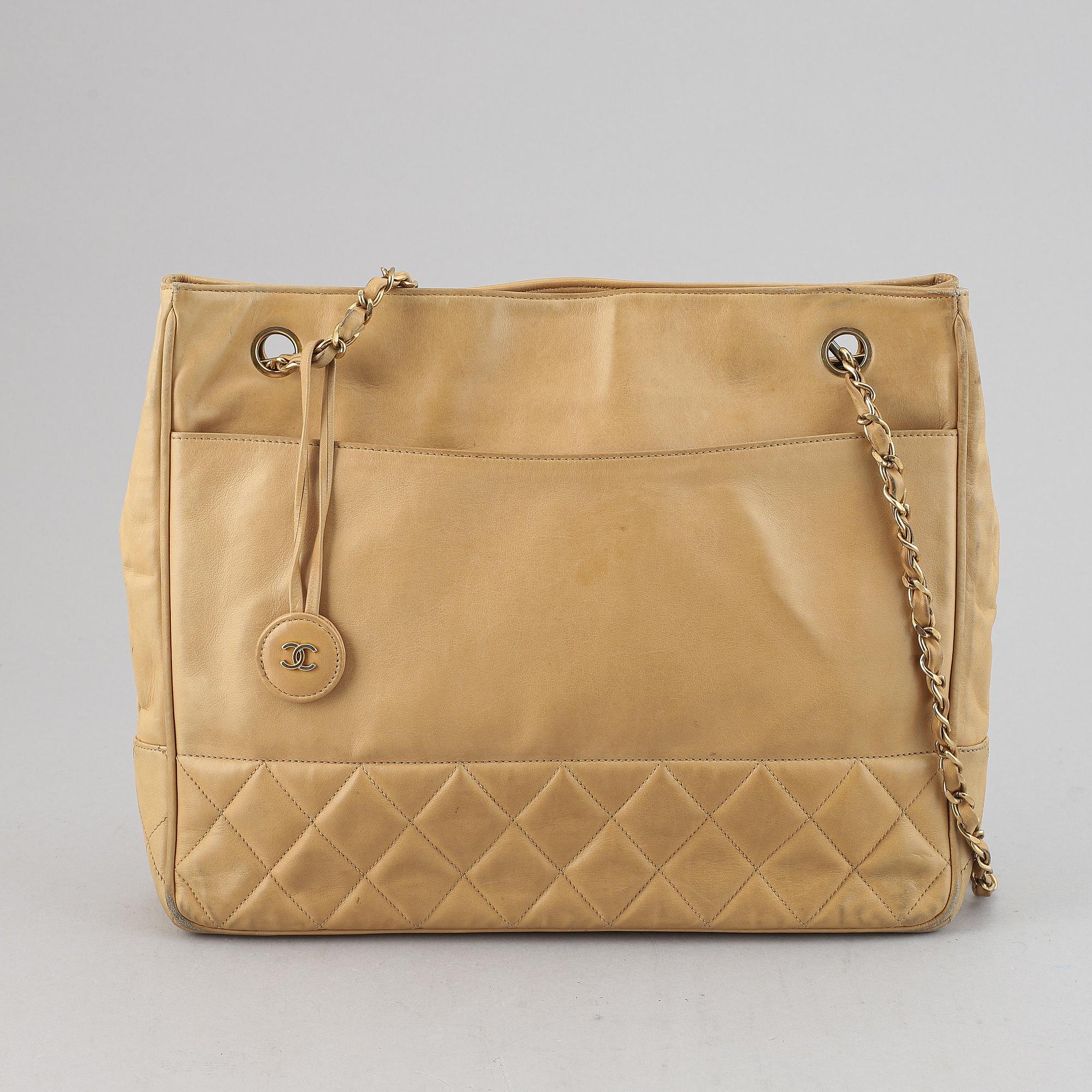 Chanel, a beige leather handbag, 1986-1988.