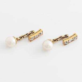 A pair of jewelled, pearl and gold Imperial presentation cufflinks by Constantine Nicholls Ewing, St Petersburg ,